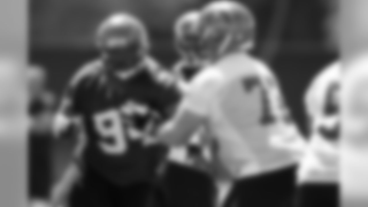 DE Greg Spires has the quarterback in his sights as he turns the corner