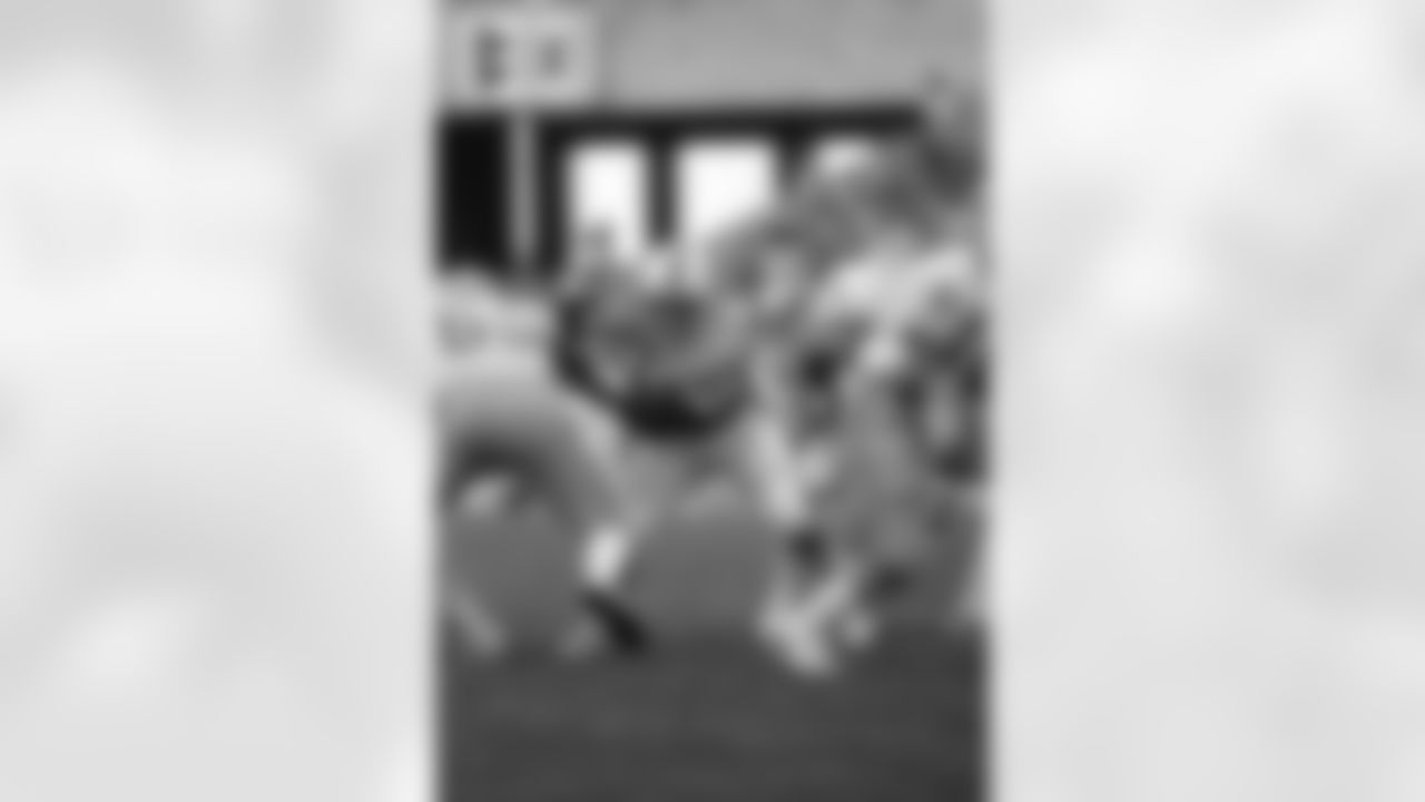TAMPA, FL - SEPTEMBER 4: Defensive tackle David Logan #76 of the Tampa Bay Buccaneers tackles against the Detroit Lions at Tampa Stadium on September 4, 1983 in Tampa, Florida. The Buccaneers lost 0-11. (photo by Allen's Studio/Tampa Bay Buccaneers)