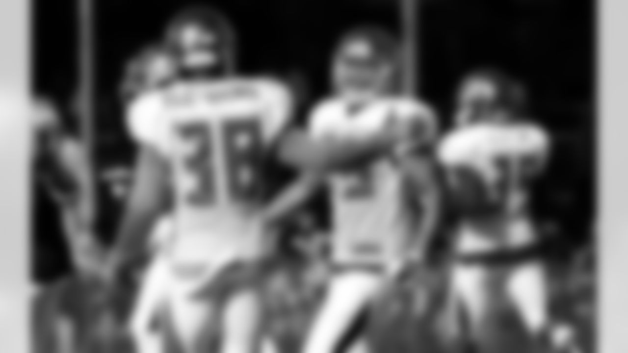 38 CB Jude Adjei-Barimah and #35 CB Javien Elliot