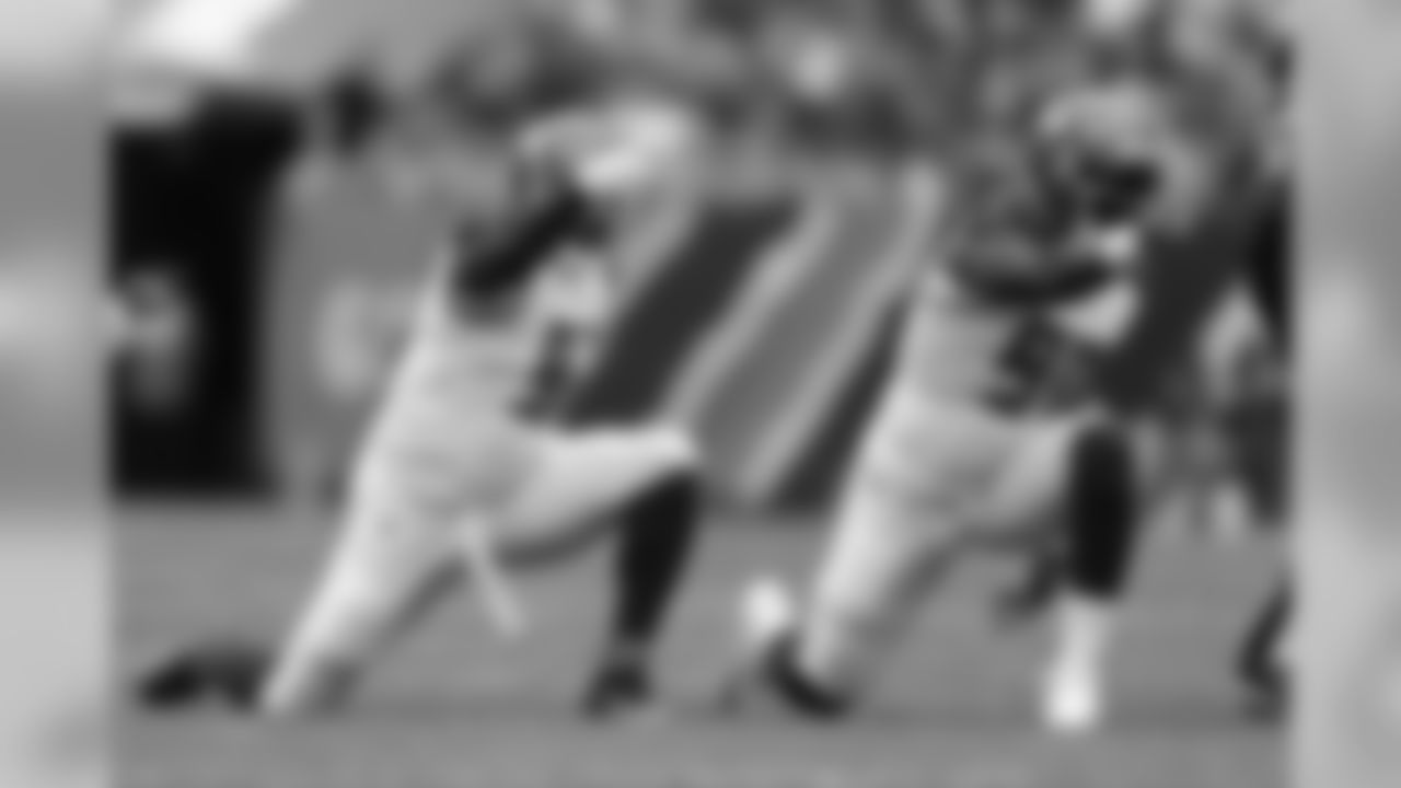 DE Jason Pierre-Paul, No. 90 and DE Vinny Curry, No. 97