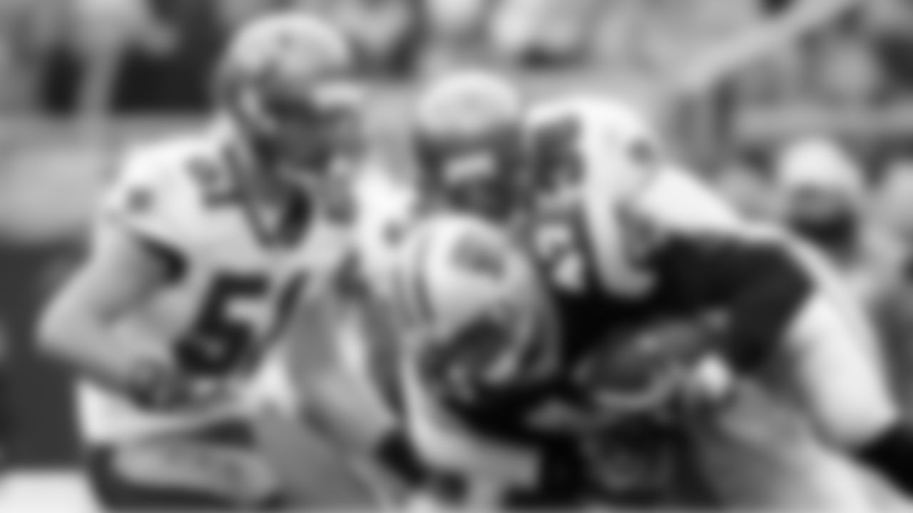 36 S Tanard Jackson powers through to stop the ball carrier