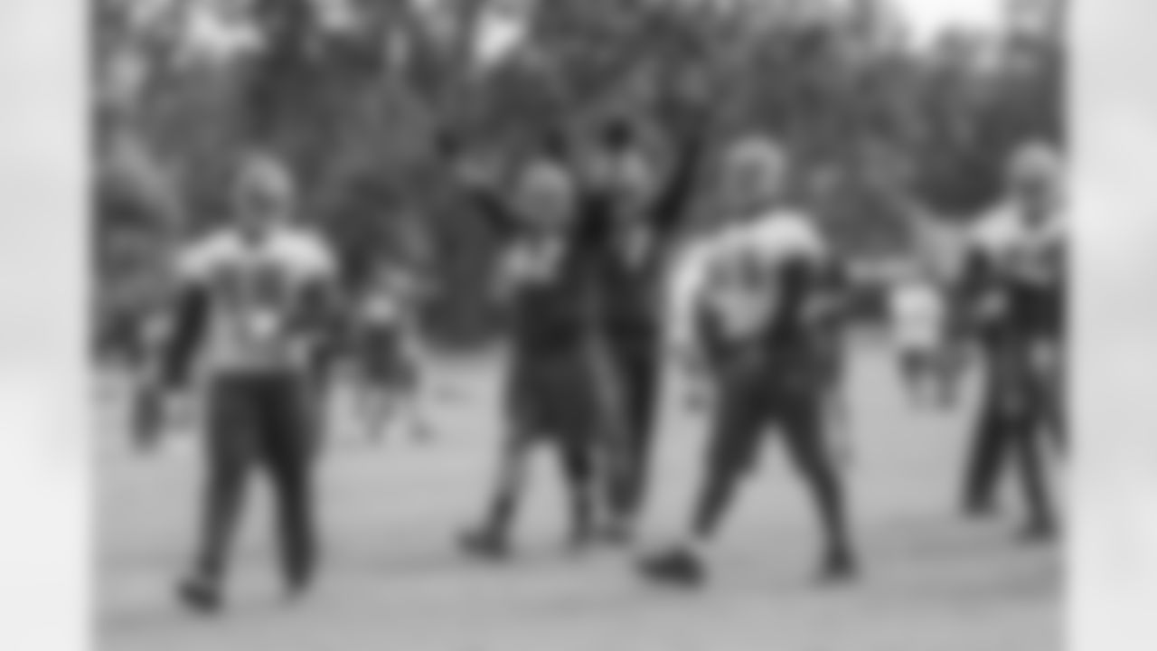 62 C Evan Smith and #77 OL Caleb Benenoch