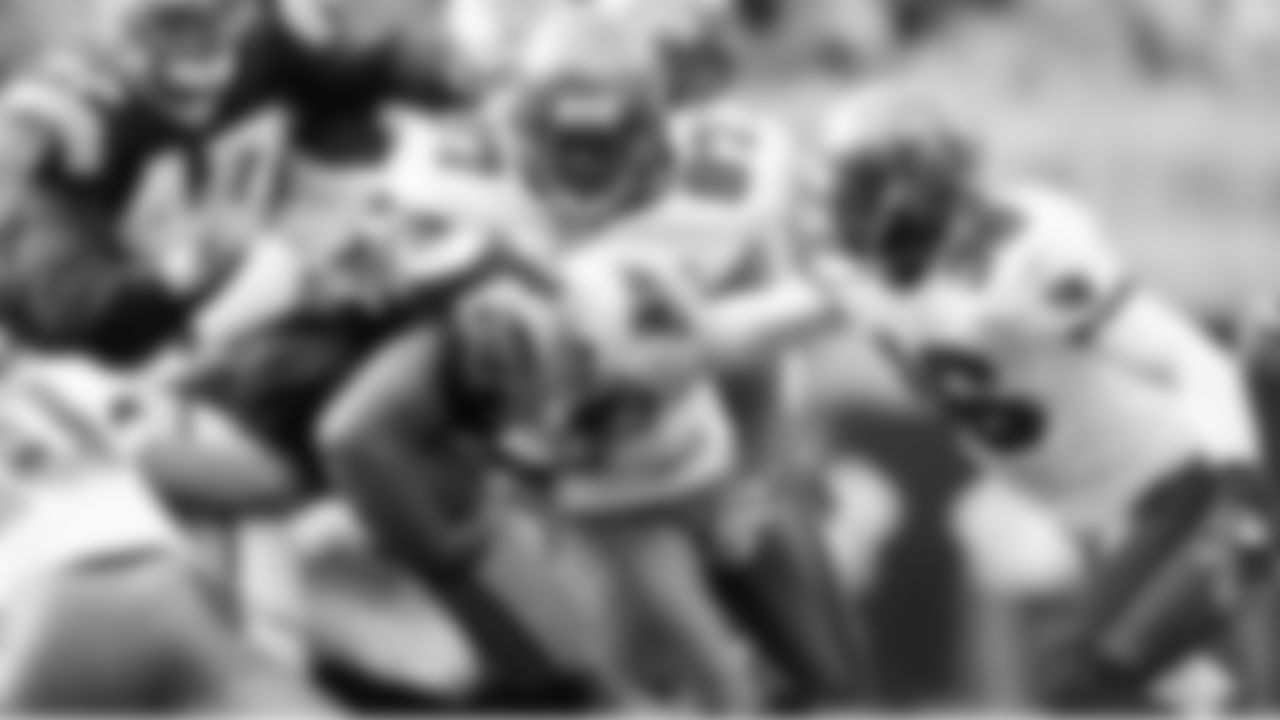 36 S Tanard Jackson charges in to add to the swarm of players to bring down the ball carrier