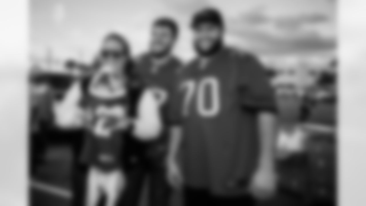 TAMPA, FL - November 21, 2022 - Offensive Lineman Robert Hainsey #70 and Tackle Justin Skule #77 of the Tampa Bay Buccaneers during the 16th Annual Turkey Time with the O-Line at AdventHealth Training Center. Photo By Kyle Zedaker/Tampa Bay Buccaneers