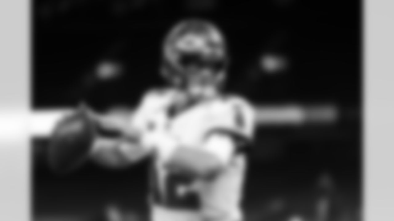 Quarterback Tom Brady goes through warm-ups for Bucs vs. Saints, Week One