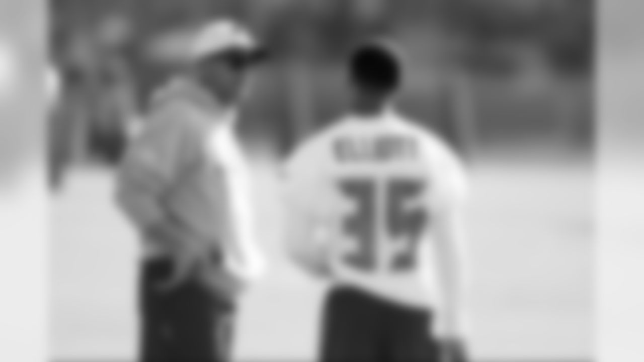 Secondary Coach Jon Hoke and #35 CB Javien Elliott