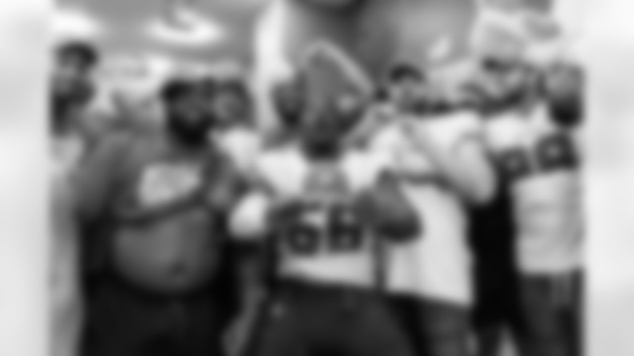 TAMPA, FL - January 01, 2023 - Linebacker Charles Snowden #48, Defensive Lineman Deadrin Senat #95, Outside Linebacker Carl Nassib #94, Outside Linebacker Joe Tryon-Shoyinka #9, Defensive Lineman William Gholston #92, Defensive Tackle Rakeem Nunez-Roches #56, Defensive Lineman Patrick O'Connor #79, Outside Linebacker Cam Gill #49, Outside Linebacker Anthony Nelson #98, and Defensive Lineman Akiem Hicks #96 of the Tampa Bay Buccaneers after the game between the Carolina Panthers and Tampa Bay Buccaneers at Raymond James Stadium. The Bucs won the game, 30-24. Photo By Kyle Zedaker/Tampa Bay Buccaneers