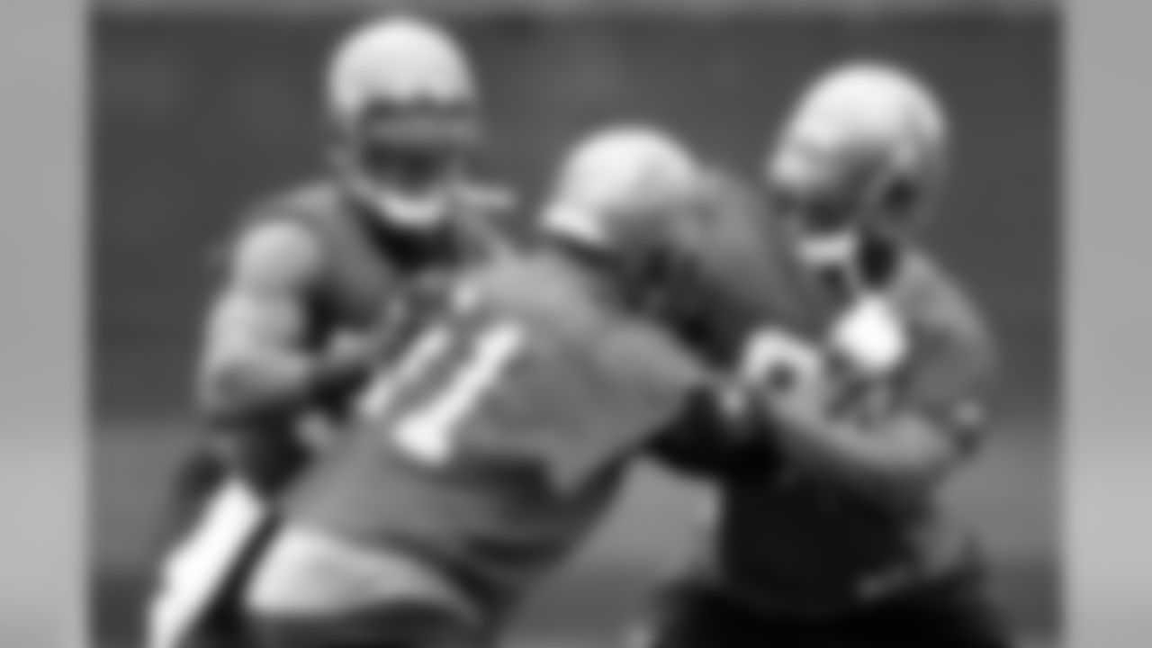 DE Greg White is the one facing a double-team as the defensive linemen work among themselves