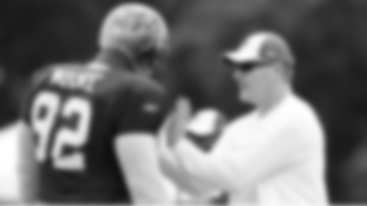 Defensive Line Coach Robert Nunn goes over some handwork details with DT Dre Moore
