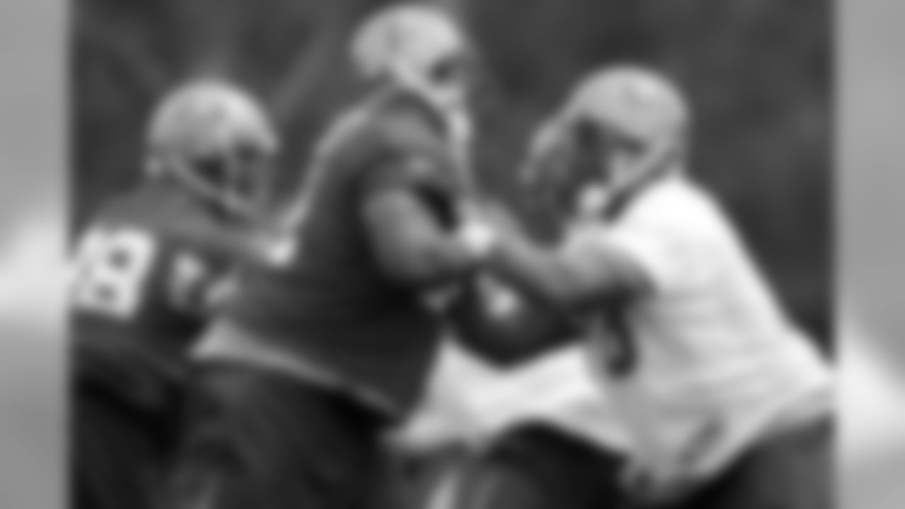 G Arron Sears stays low to maintain his leverage on the man he's blocking