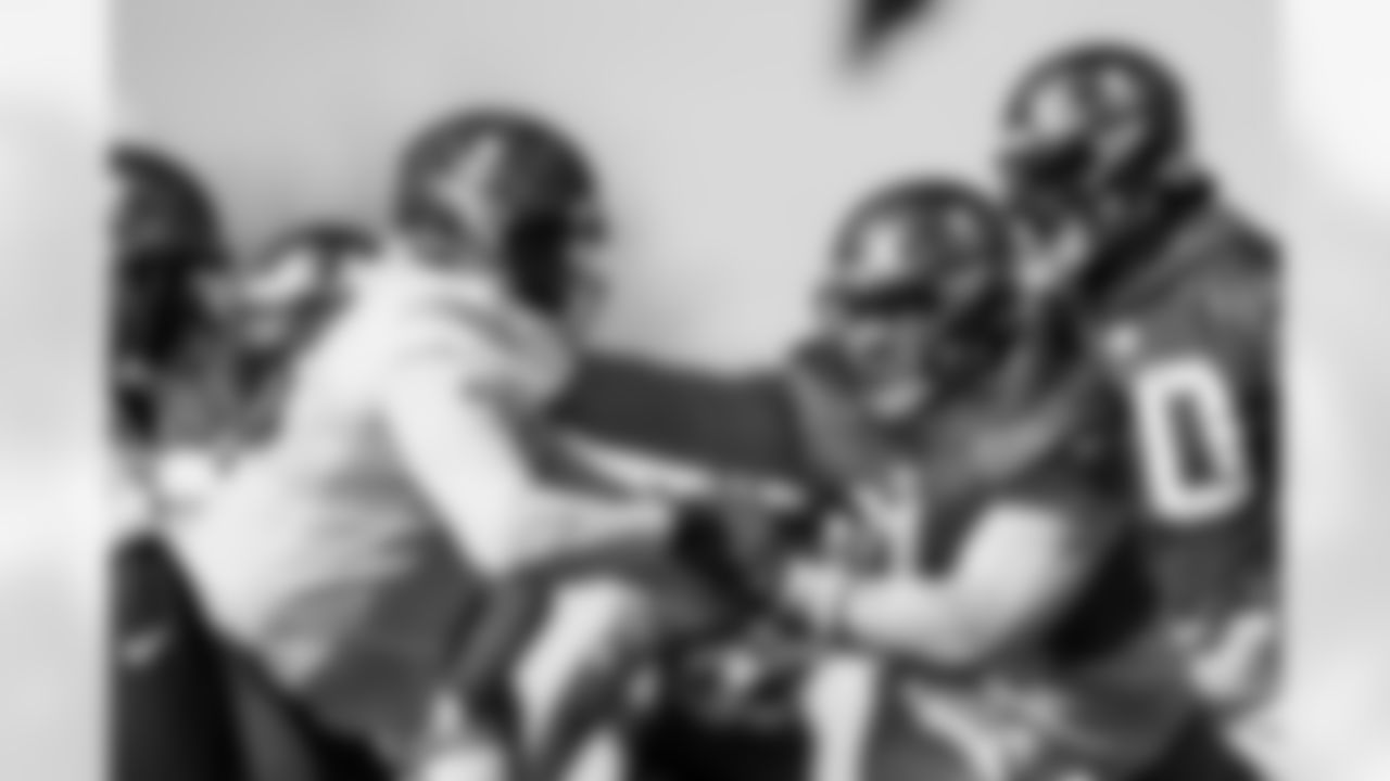 TAMPA, FL - DECEMBER 24, 2021 - Tackle Brandon Walton #73 and Inside Linebacker Grant Stuard #48 of the Tampa Bay Buccaneers during practice at AdventHealth Training Center. Photo By Tori Richman/Tampa Bay Buccaneers