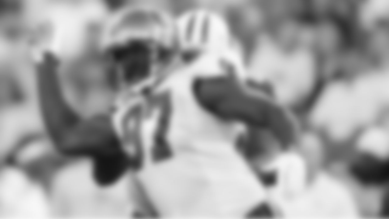 97 DE Jimmy Wilkerson moves in to break up a pass