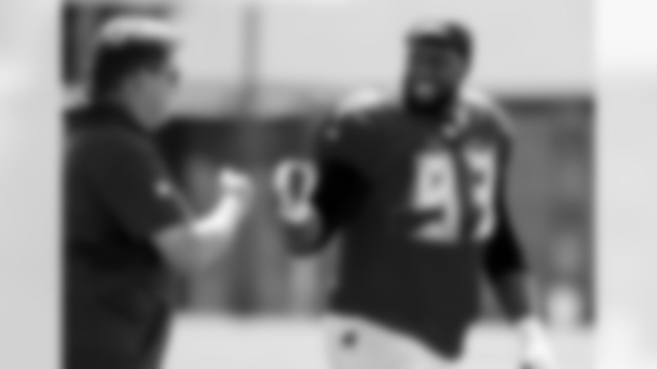 General Manager Jason Licht and #93 DT Gerald McCoy