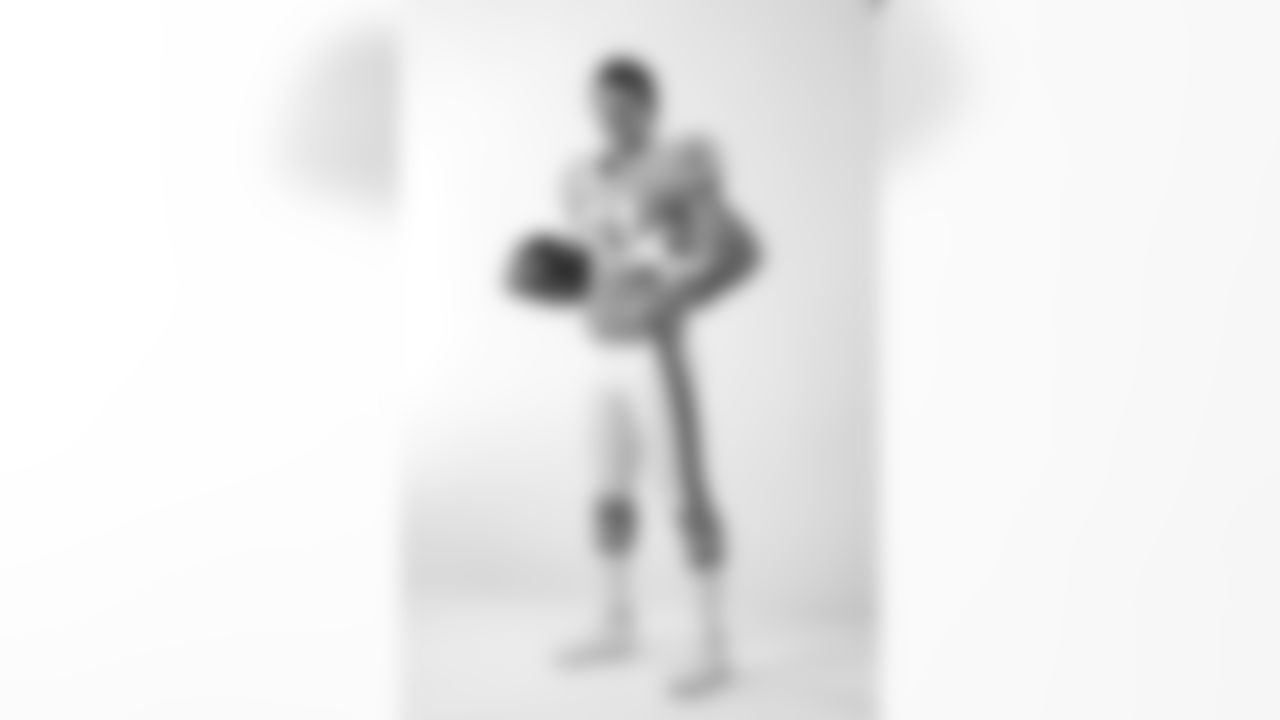Linebacker Barrett Ruud #51 of the Tampa Bay Buccaneers in a 1976 Buccaneers throwback jersey during a studio photo shoot at One Buccaneer Place in Tampa, Florida.