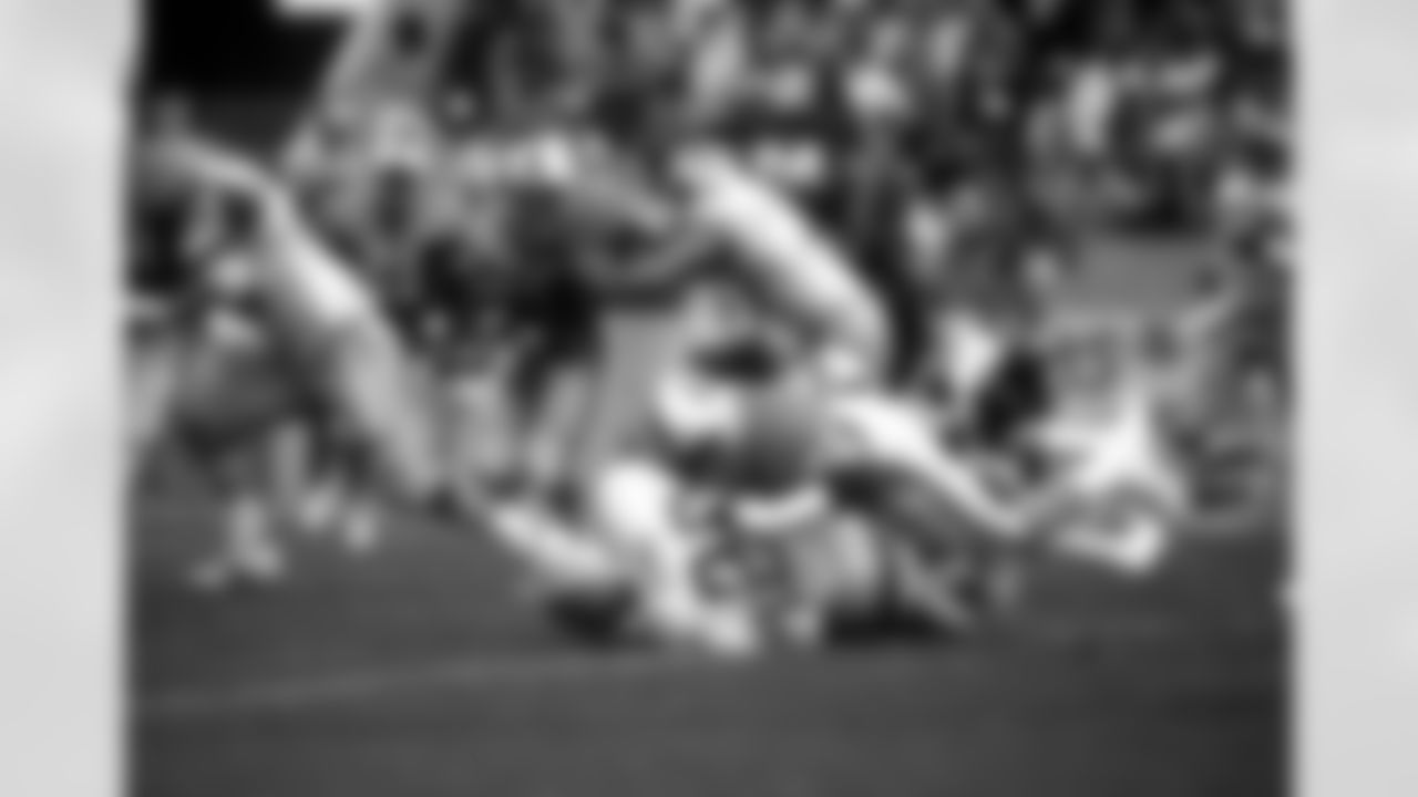 TAMPA, FL - SEPTEMBER 4: Linebacker Jeff Davis #58 of the Tampa Bay Buccaneers tackles against the Detroit Lions at Tampa Stadium on September 4, 1983 in Tampa, Florida. The Buccaneers lost 0-11. (photo by Allen's Studio/Tampa Bay Buccaneers)