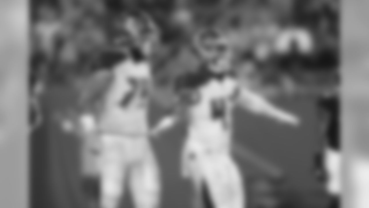 DE Patrick O'Connor, No. 79 and LB Cameron Lynch, No. 43