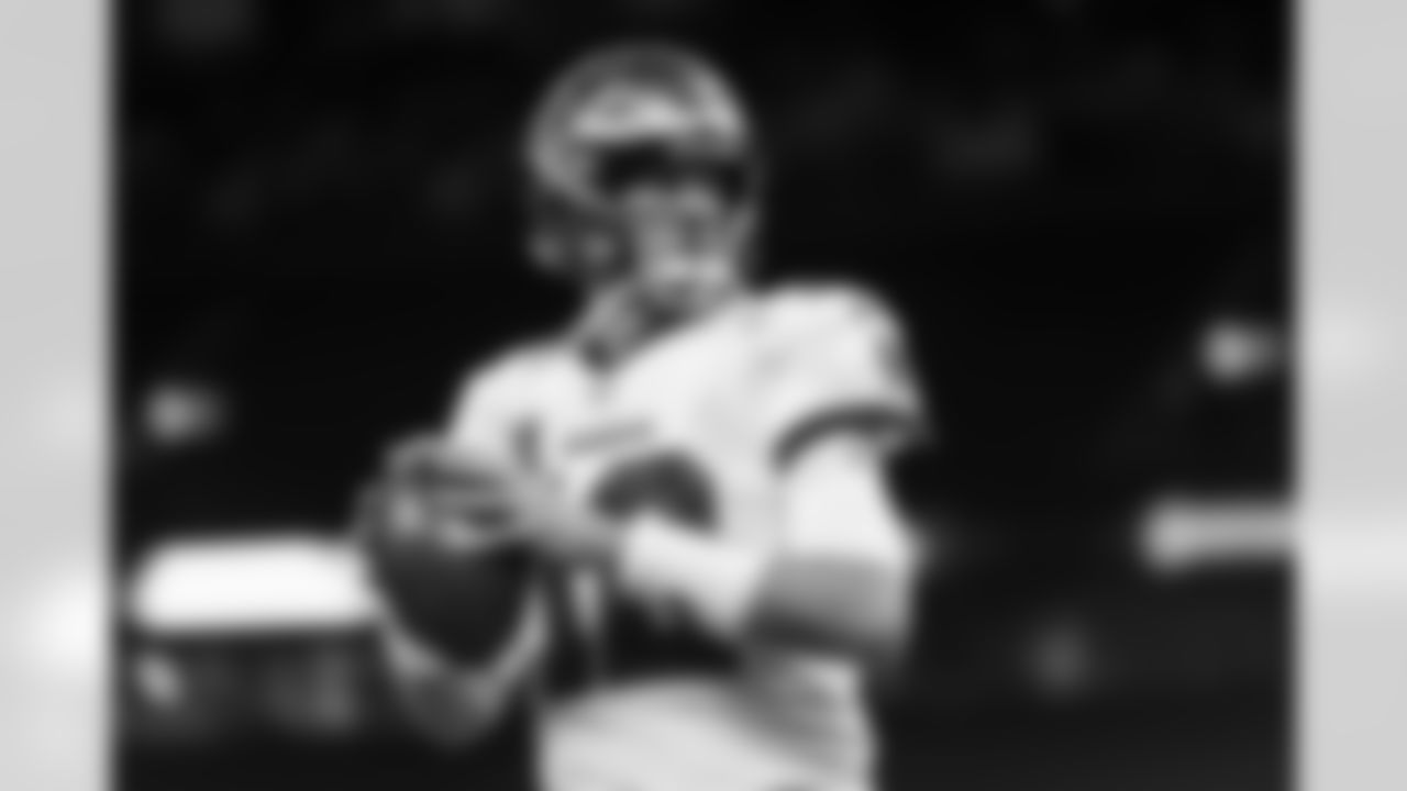 Quarterback Tom Brady goes through warm-ups for Bucs vs. Saints, Week One