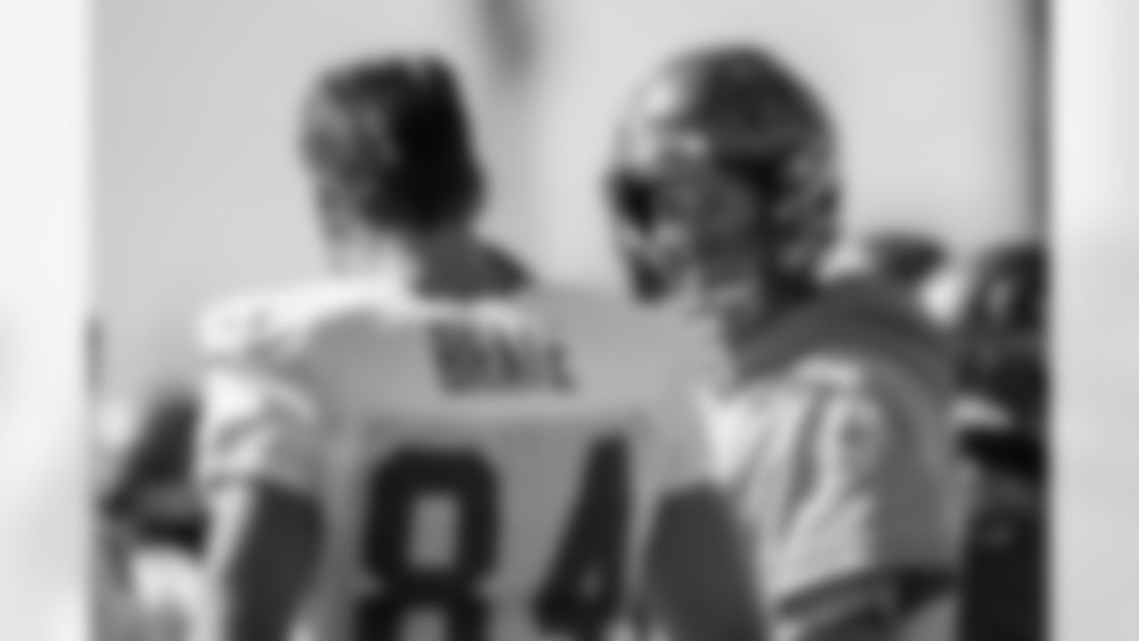 TAMPA, FL - DECEMBER 24, 2021 - Quarterback Tom Brady #12 and Tight End Cameron Brate #84 of the Tampa Bay Buccaneers during practice at AdventHealth Training Center. Photo By Tori Richman/Tampa Bay Buccaneers