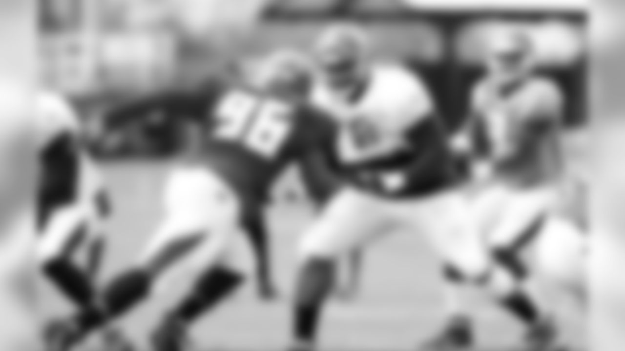 96 DE Ryan Russell and #76 OT Donovan Smith