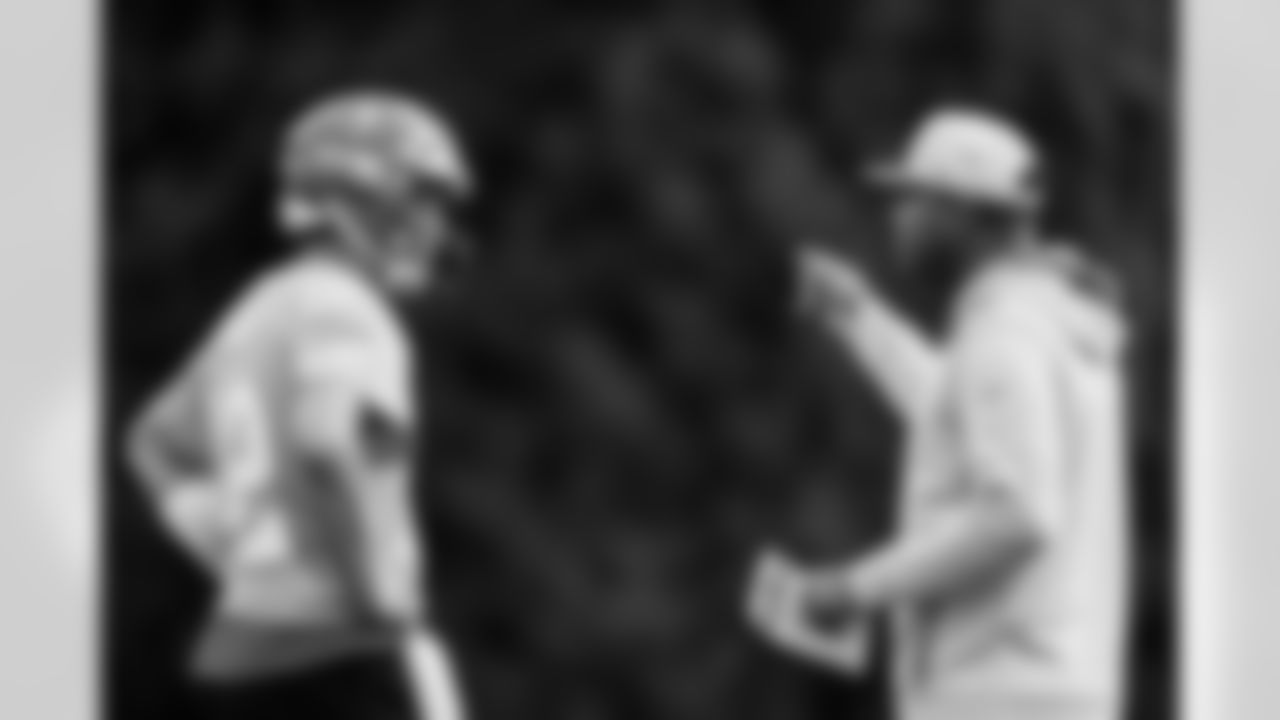 TAMPA, FL - January 21, 2022 - Quarterback Tom Brady #12 and Offensive Coordinator Byron Leftwich of the Tampa Bay Buccaneers during practice at AdventHealth Training Center. Photo By Kyle Zedaker/Tampa Bay Buccaneers