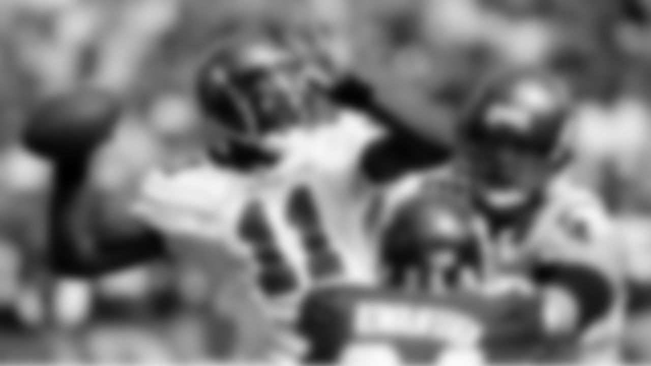 11 QB Josh Johnson tries to find an open target in the endzone