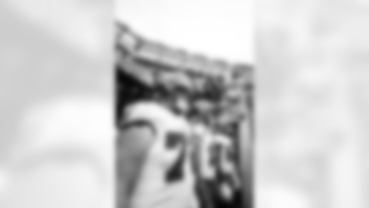 EAST RUTHERFORD, NJ - January 02, 2022 - Offensive Tackle Josh Wells #72, Wide Receiver Mike Evans #13, and Inside Linebacker K.J. Britt #52 of the Tampa Bay Buccaneers before the game between the Tampa Bay Buccaneers and New York Jets at MetLife Stadium. The Buccaneers won the game, 28-24. Photo By Kyle Zedaker/Tampa Bay Buccaneers