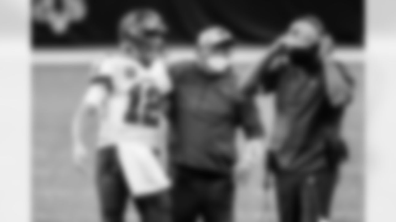 NEW ORLEANS, LA - JANUARY 17, 2021 - Quarterback Tom Brady #12, Offensive Coordinator Byron Leftwich and Head Coach Bruce Arians of the Tampa Bay Buccaneers during the NFC Divisional Round game between the Tampa Bay Buccaneers and New Orleans Saints at Mercedes-Benz Superdome. The Buccaneers won the game, 30-20. Photo By Tori Richman/Tampa Bay Buccaneers