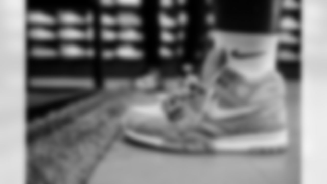 TAMPA, FL - May 03, 2022 - Running Back Giovani Bernard #25 of the Tampa Bay Buccaneers' sneakers during an episode of The Bay at Soleciety Sneaker Boutique. Photo By Kyle Zedaker/Tampa Bay Buccaneers