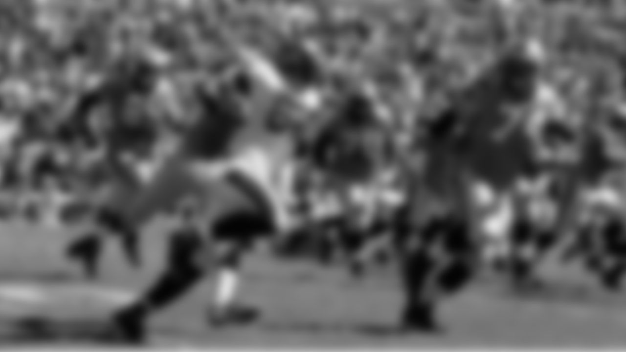 58 LB Quincy Black recovers a blocked field goal of the Panthers