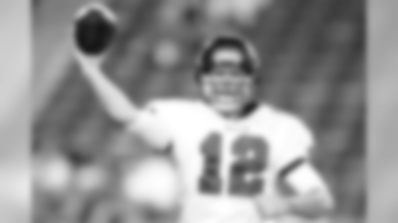 12 QB Rudy Carpenter looks for an open receiver