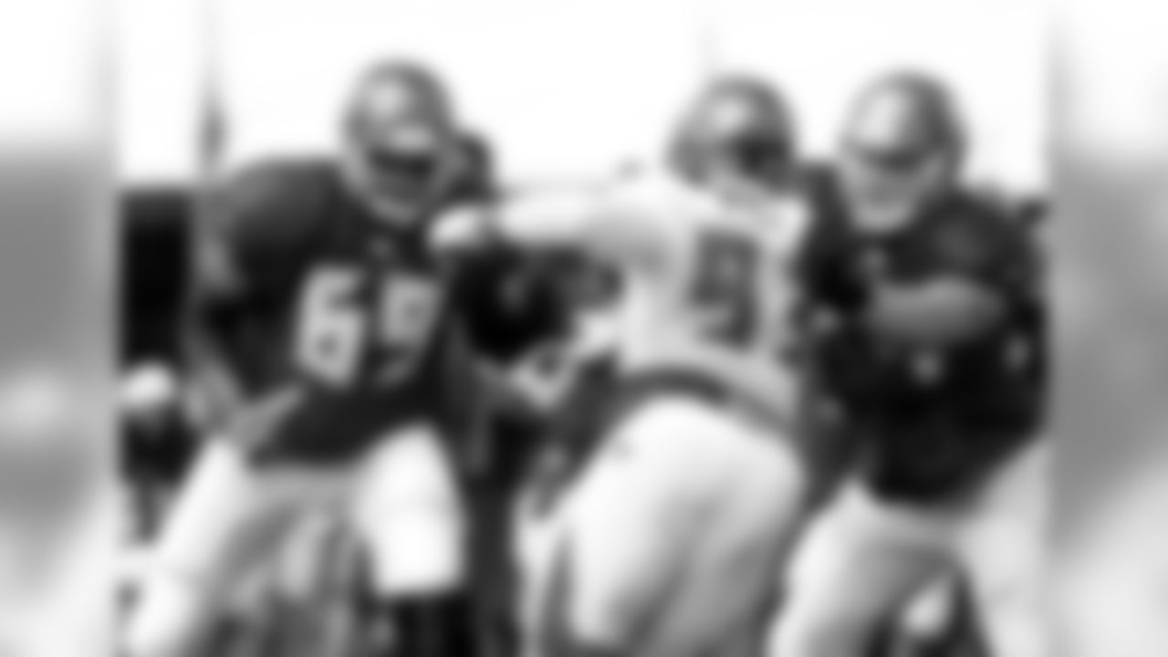 69 T Demar Dotson and #93 DT Gerald McCoy