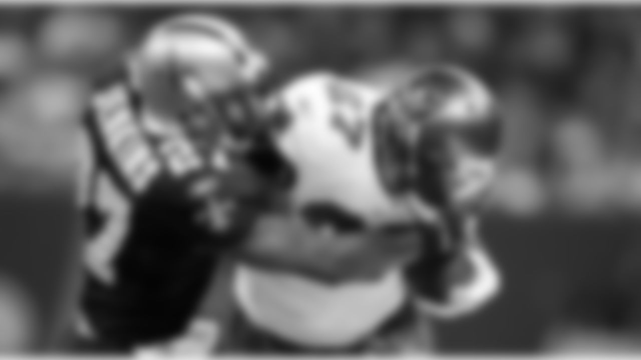 27 RB Legarrette Blount fights off tackles to keep the ball moving