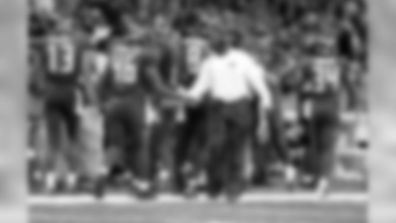 FB Jorvorskie Lane SR. and HC Lovie Smith