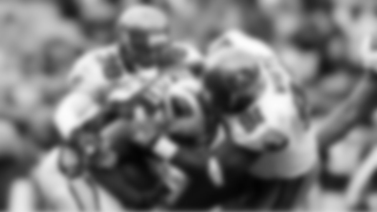 91 DE Stylez G. White powers the ball carrier to the ground