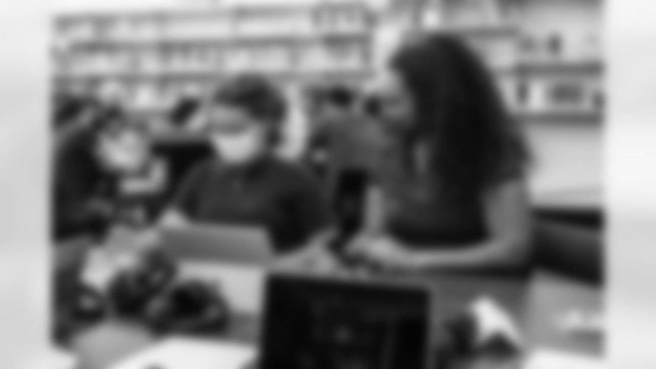 TAMPA, FL - OCTOBER 18, 2021 - Students at Young Middle School work with their mentors during the Tampa Bay Buccaneers Youth Leadership program. Photo By Tori Richman/Tampa Bay Buccaneers