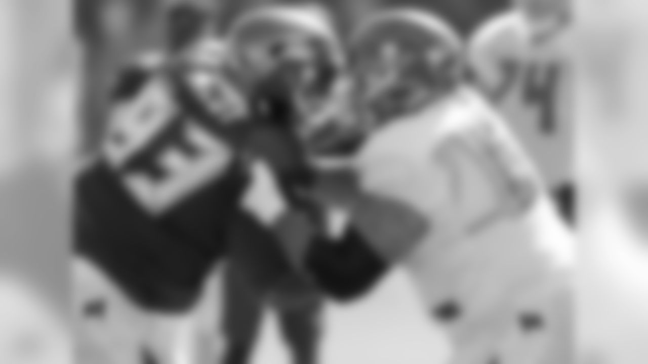 DT Gerald McCoy and C Evan Smith