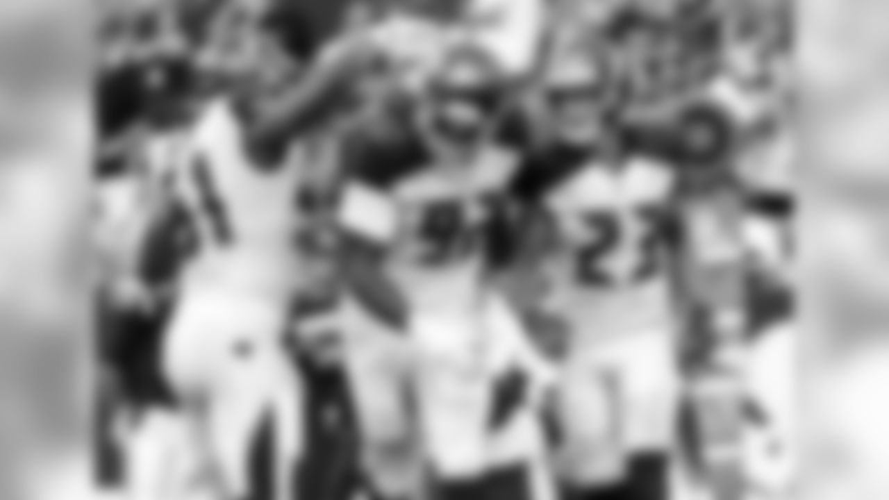 51 LB Daryl Smith, #92 DE William Gholston, and #23 S Chris Conte
