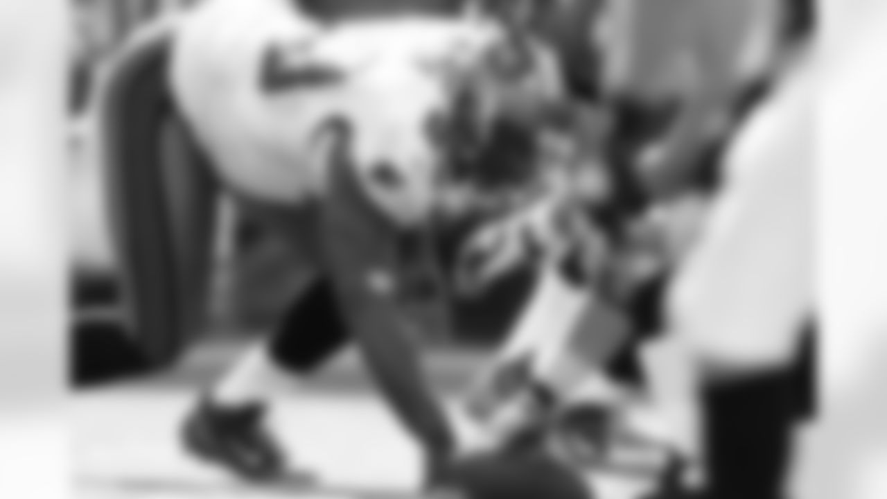 93 DT Gerald McCoy is poised and ready for the snap