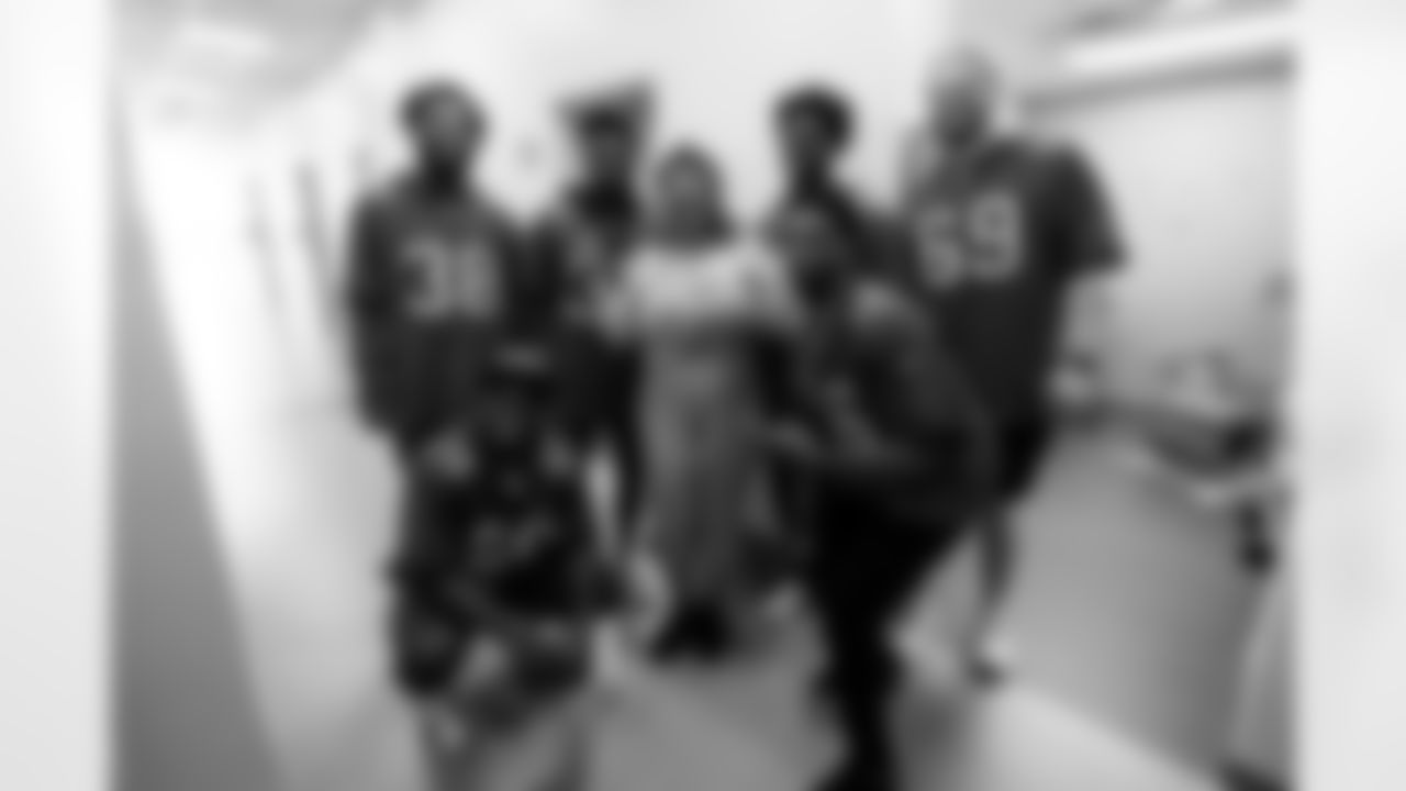 TAMPA, FL - October 17, 2023 - Safety Christian Izien #29, Cornerback Derrek Pitts #38, Defensive Back Josh Hayes #32, Defensive Lineman Calijah Kancey #94, Cornerback Keenan Isaac #16, and Guard Cody Mauch #69 of the Tampa Bay Buccaneers during a Rookie Club visit to Moffitt Cancer Center. Photo By Kyle Zedaker/Tampa Bay Buccaneers