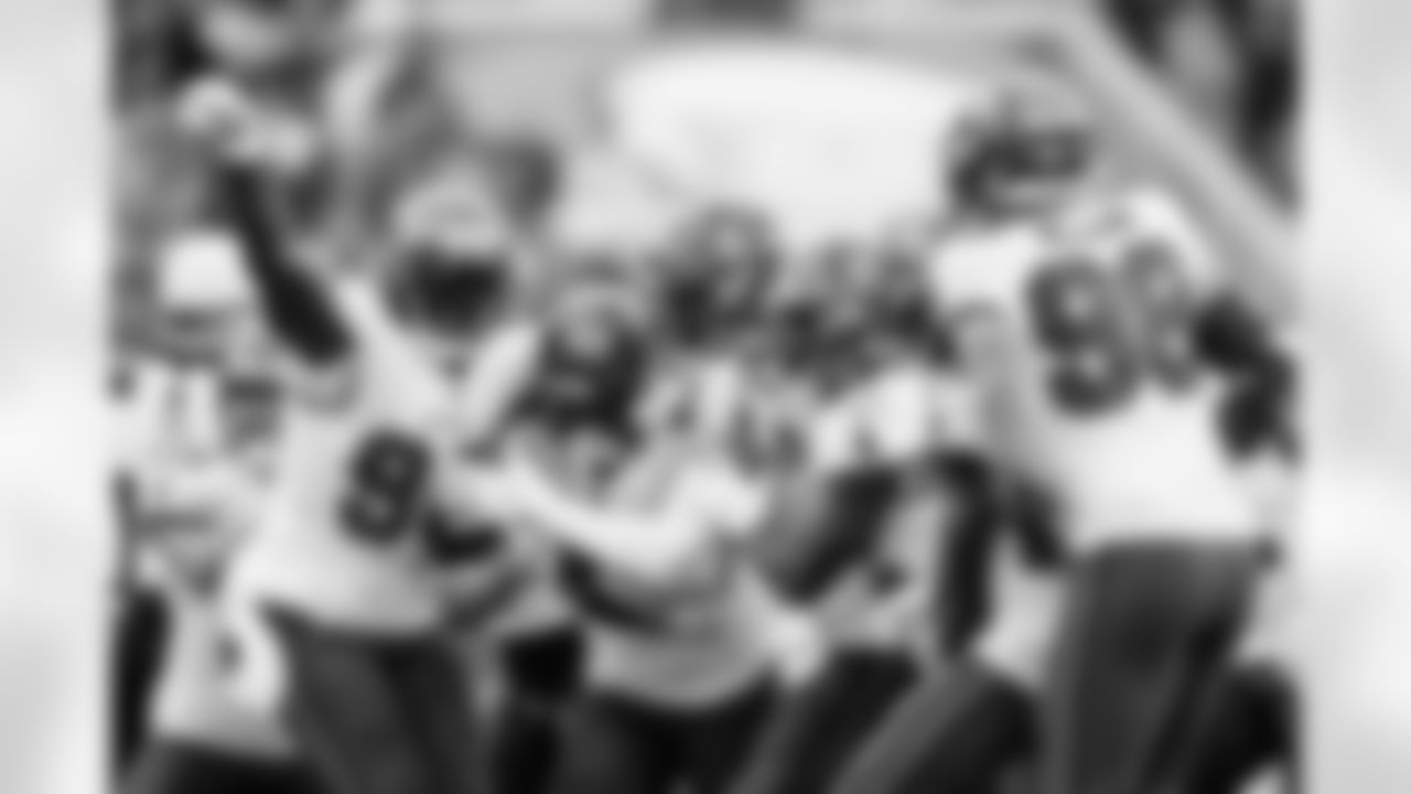 TAMPA, FL - January 16, 2022 - Outside Linebacker Jason Pierre-Paul #90, Outside Linebacker Shaquil Barrett #58, Outside Linebacker Joe Tryon-Shoyinka #9, Inside Linebacker K.J. Britt #52, and Outside Linebacker Anthony Nelson #98 of the Tampa Bay Buccaneers celebrate a turnover during the NFC Wild Card game between the Philadelphia Eagles and Tampa Bay Buccaneers at Raymond James Stadium. The Buccaneers won the game, 31-15. Photo By Kyle Zedaker/Tampa Bay Buccaneers