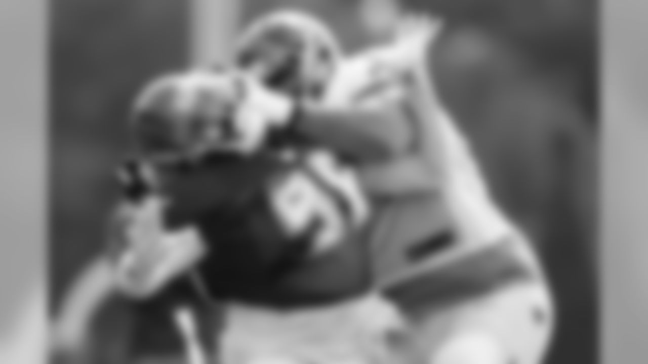 T Kevin Pamphile and DE T.J. Fatinikun