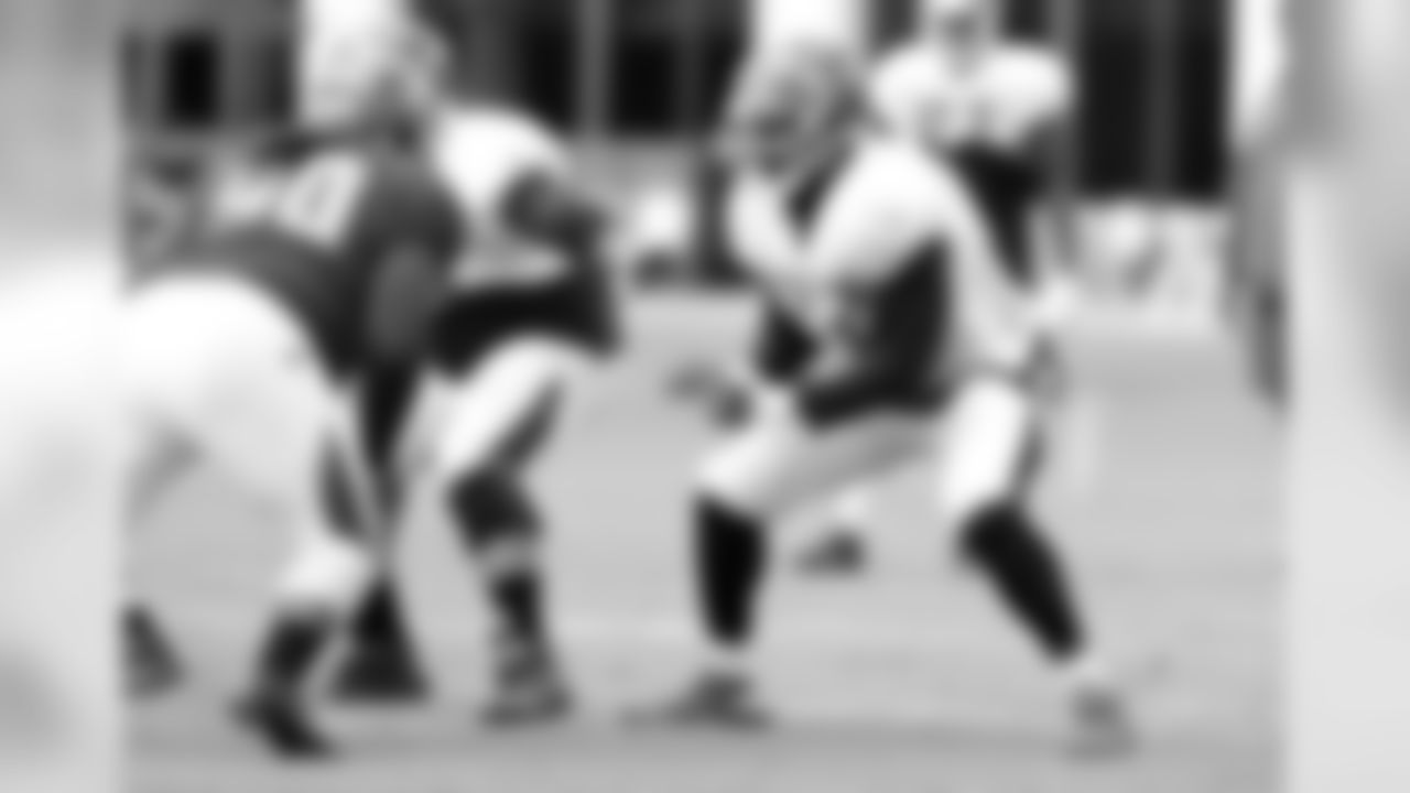 90 DT Rodney Coe and #77 OL Caleb Benenoch