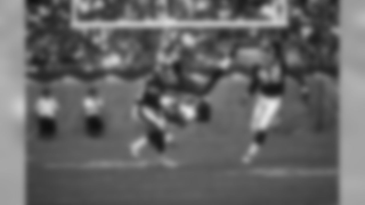Wide receiver Reidel Anthony #85 of the Tampa Bay Buccaneers gets upended against the New York Giants at Raymond James Stadium in Tampa.