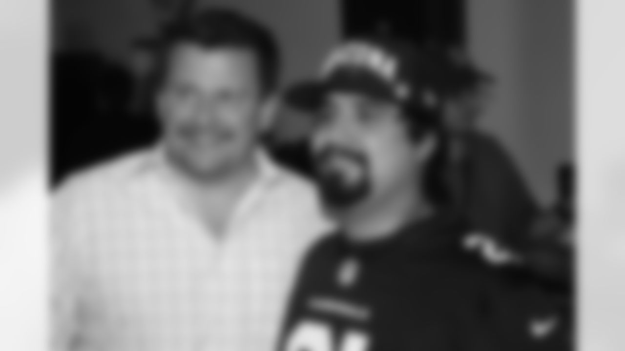 President Michael Bidwill and a fan