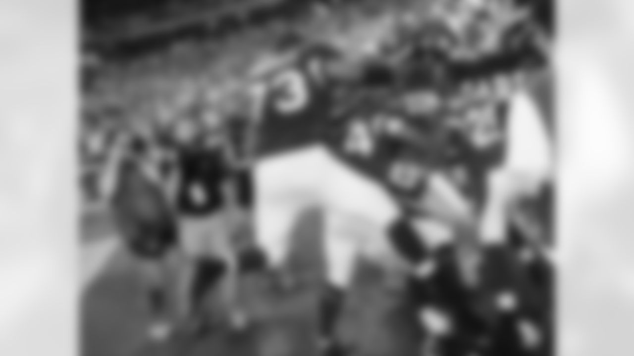 Celebrating after LB Karlos Danbsy's fumble recovery for a touchdown in overtime