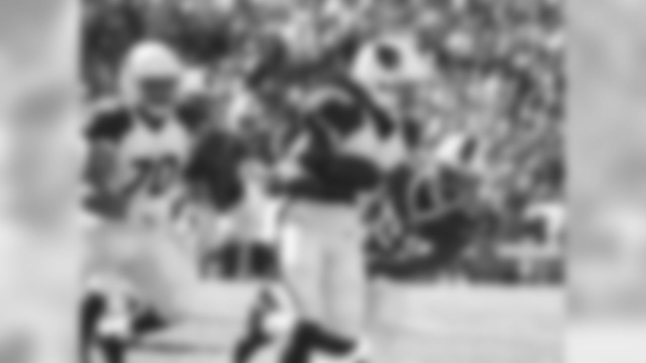 RB Andre Ellington returns a kick