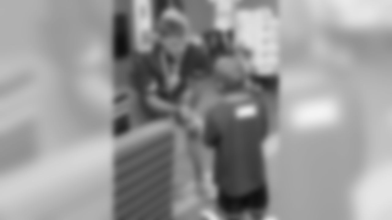 P Drew Butler talks to a patient