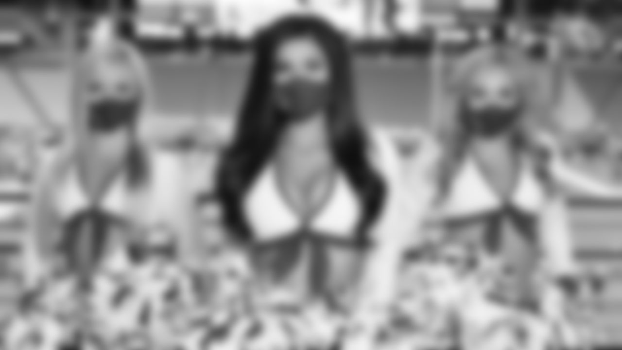 Images of the Cardinals cheerleaders during the Week 3 matchup against the Lions.