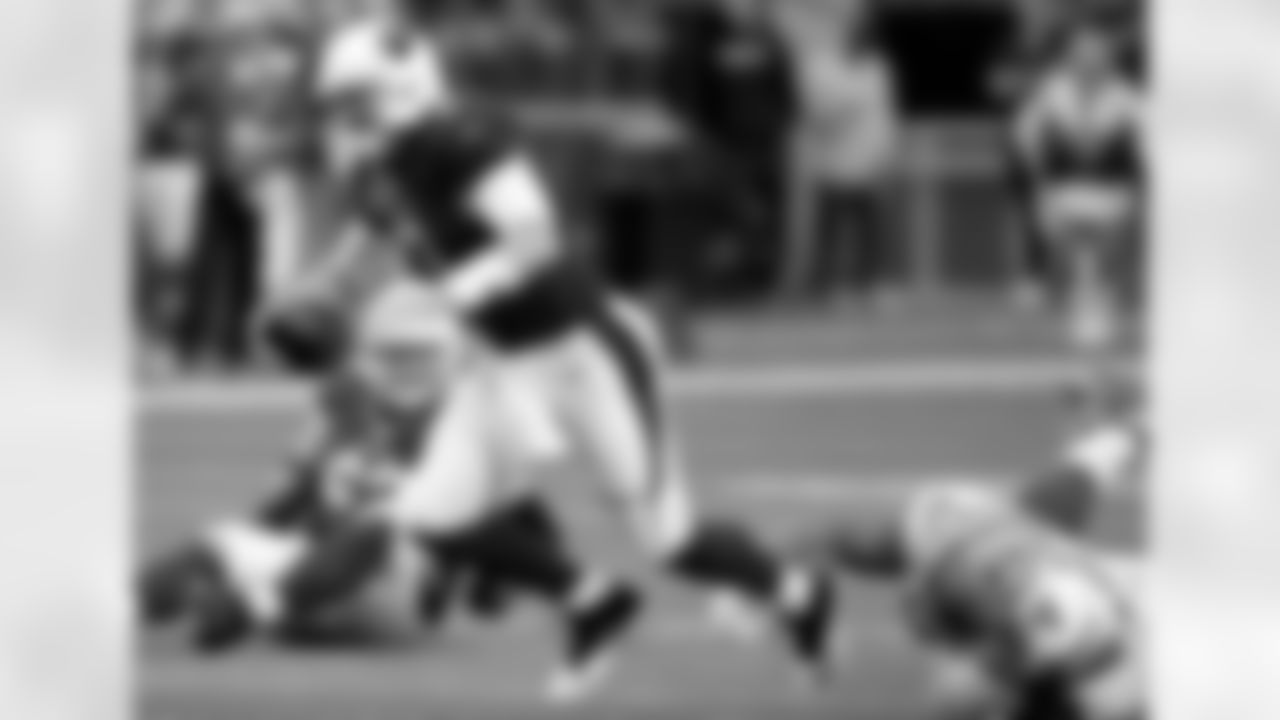 QB Carson Palmer is sacked while trying to scramble