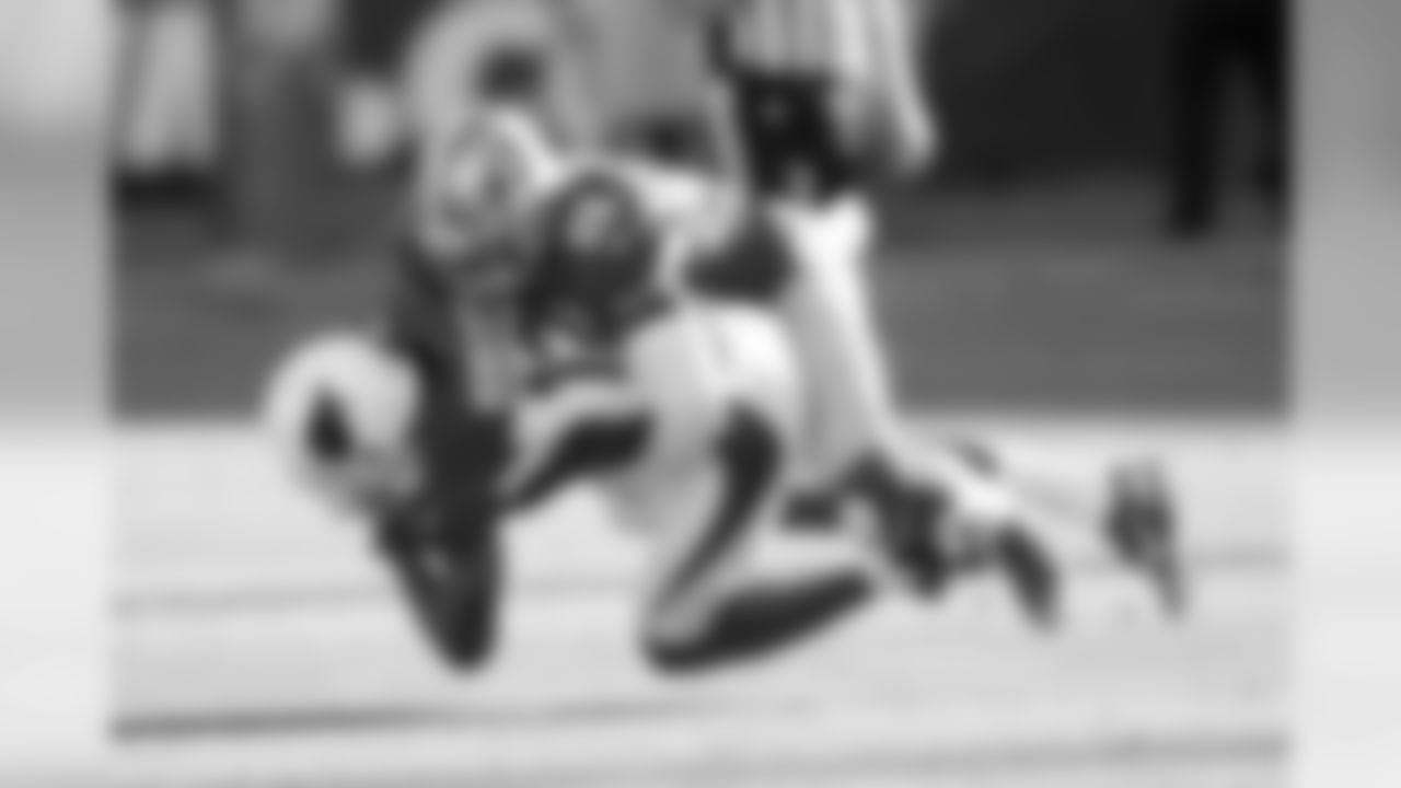 WR Andre Roberts is hit by 49ers CB Tramaine Brock.